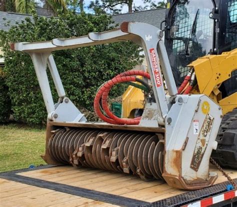 daf skid steer attachments